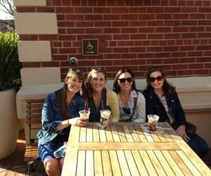 Ladies enjoying our ice cream outside Ghirardelli Photo, San Francisco, California 